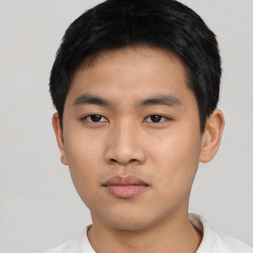Neutral asian young-adult male with short  black hair and brown eyes