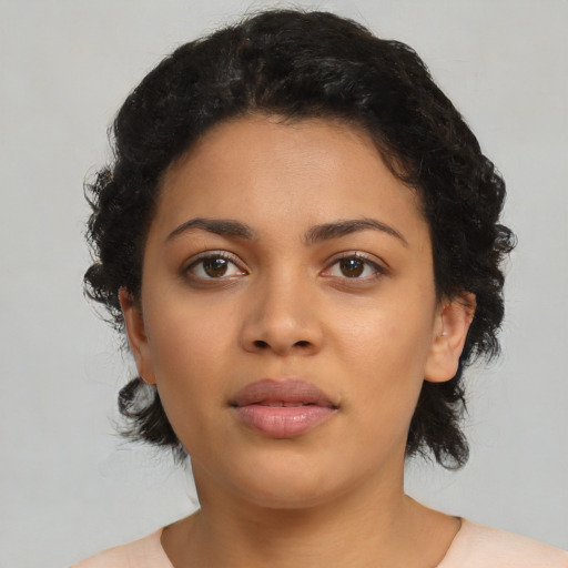 Neutral latino young-adult female with medium  black hair and brown eyes