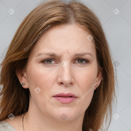 Joyful white adult female with medium  brown hair and grey eyes