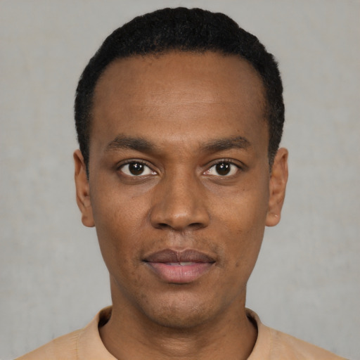 Neutral black young-adult male with short  black hair and brown eyes