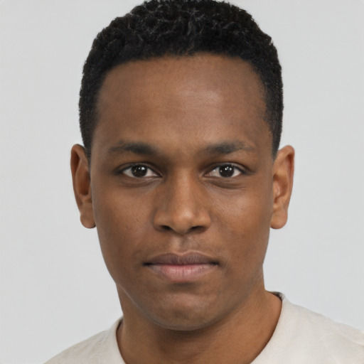 Neutral black young-adult male with short  black hair and brown eyes