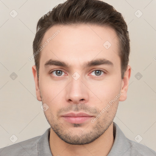 Neutral white young-adult male with short  brown hair and brown eyes