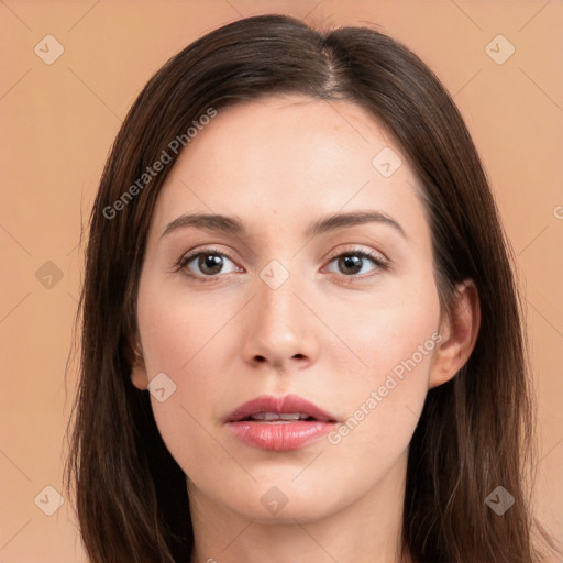 Neutral white young-adult female with long  brown hair and brown eyes