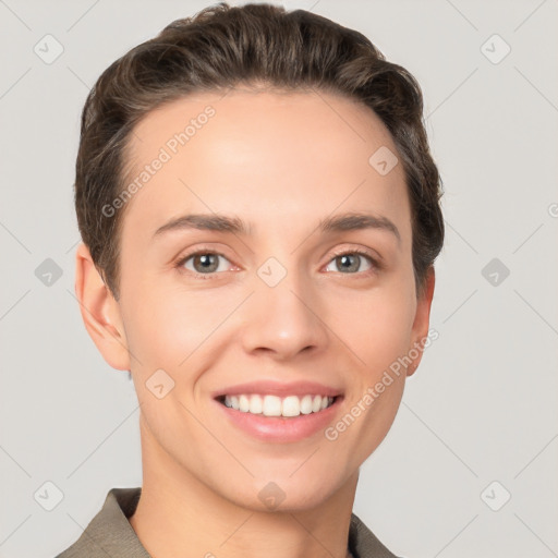 Joyful white young-adult female with short  brown hair and grey eyes