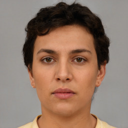 Neutral white young-adult female with short  brown hair and brown eyes