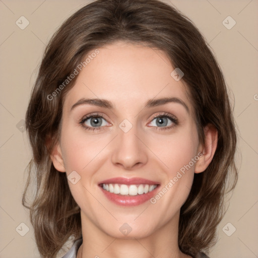 Joyful white young-adult female with medium  brown hair and green eyes