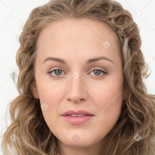 Joyful white young-adult female with long  brown hair and green eyes