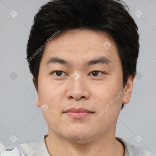 Neutral asian young-adult male with short  brown hair and brown eyes