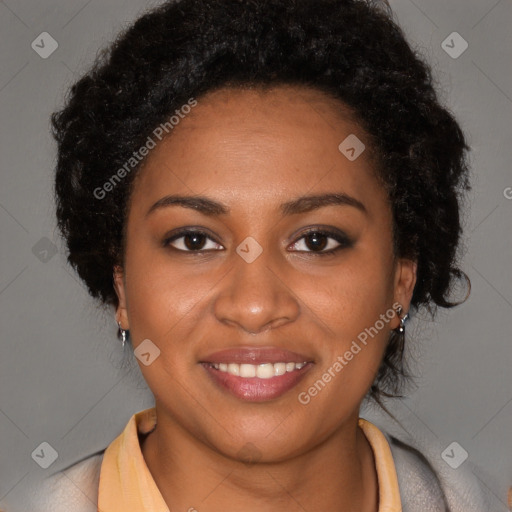 Joyful black young-adult female with long  brown hair and brown eyes