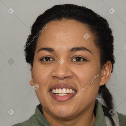 Joyful latino young-adult female with short  black hair and brown eyes