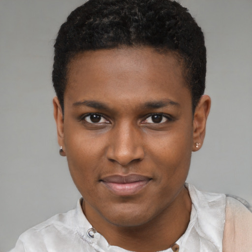 Joyful black young-adult male with short  brown hair and brown eyes