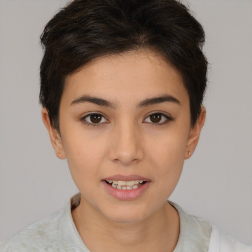 Joyful white young-adult female with short  brown hair and brown eyes
