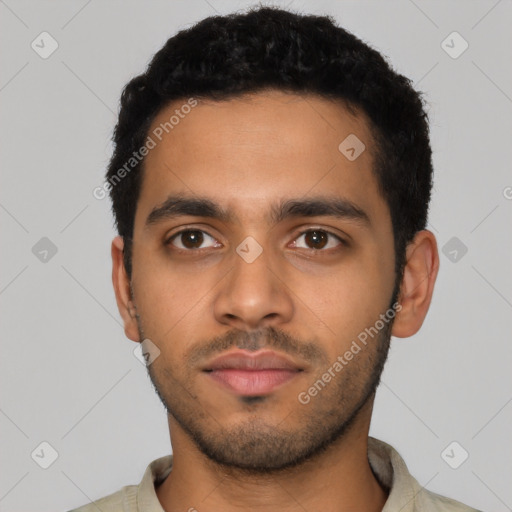 Neutral latino young-adult male with short  black hair and brown eyes