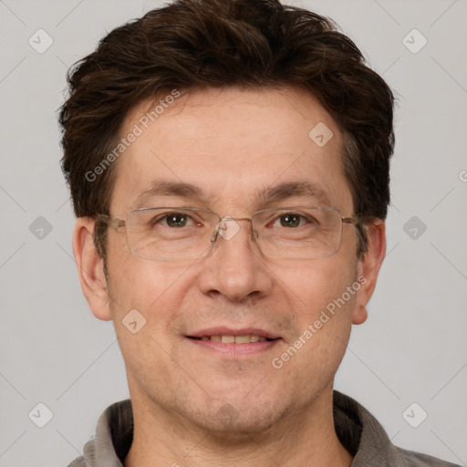 Joyful white adult male with short  brown hair and grey eyes