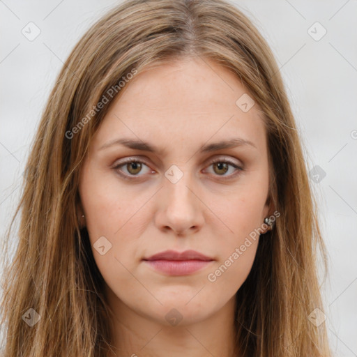 Neutral white young-adult female with long  brown hair and green eyes