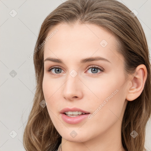 Neutral white young-adult female with long  brown hair and blue eyes