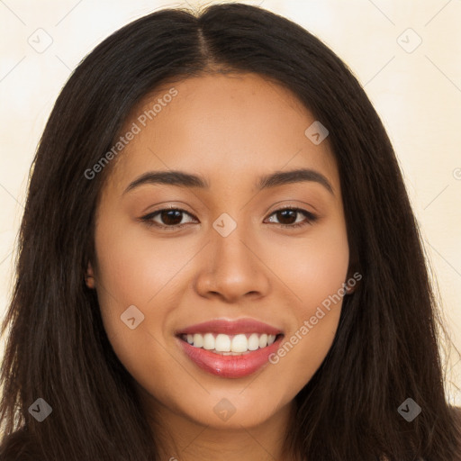 Joyful latino young-adult female with long  brown hair and brown eyes