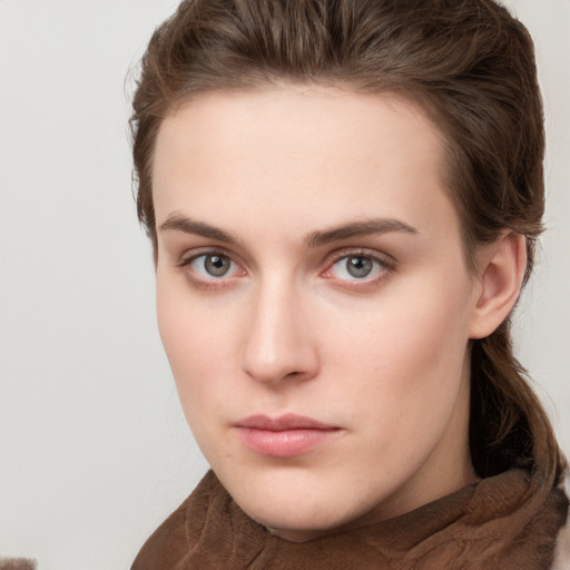 Neutral white young-adult female with long  brown hair and grey eyes