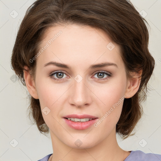 Joyful white young-adult female with medium  brown hair and green eyes