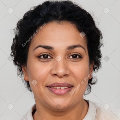 Joyful latino adult female with short  brown hair and brown eyes