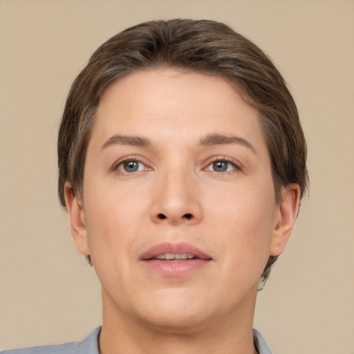 Joyful white adult female with short  brown hair and brown eyes