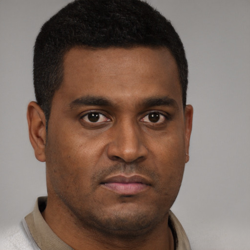 Neutral black young-adult male with short  brown hair and brown eyes