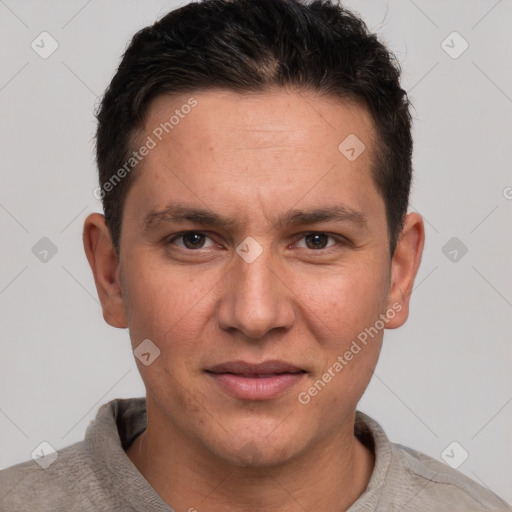 Joyful white adult male with short  brown hair and brown eyes