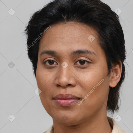 Joyful asian adult female with medium  brown hair and brown eyes