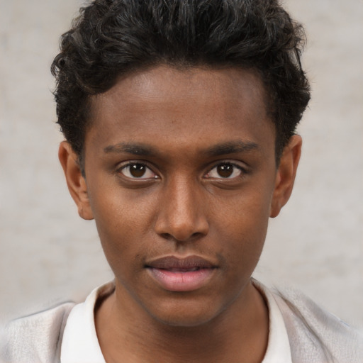 Neutral black young-adult male with short  brown hair and brown eyes