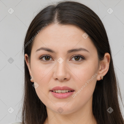 Joyful white young-adult female with long  brown hair and brown eyes