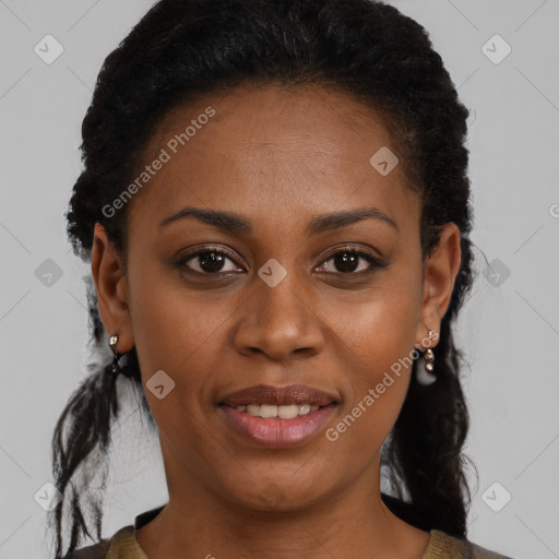 Joyful black young-adult female with medium  brown hair and brown eyes