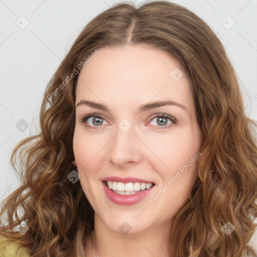 Joyful white young-adult female with long  brown hair and green eyes