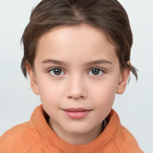 Joyful white child female with medium  brown hair and brown eyes