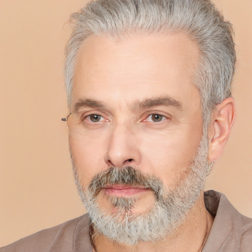 Neutral white middle-aged male with short  gray hair and brown eyes