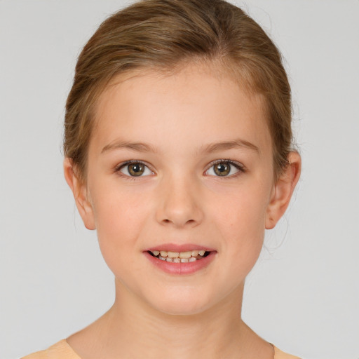 Joyful white child female with medium  brown hair and brown eyes