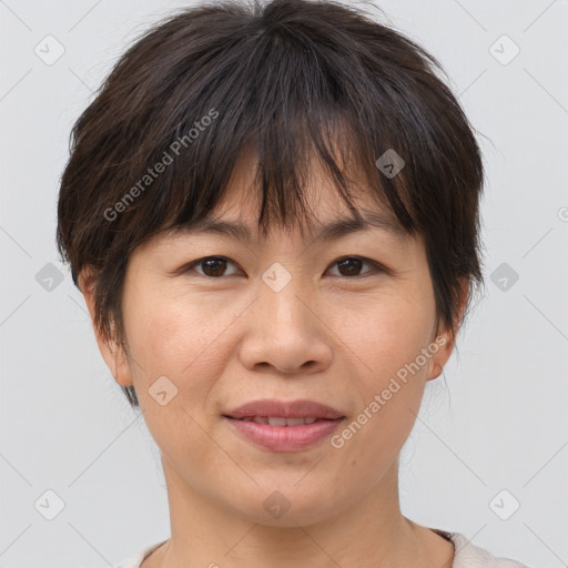 Joyful white adult female with medium  brown hair and brown eyes