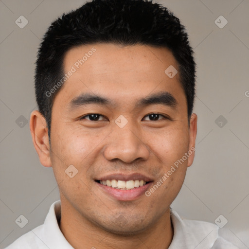 Joyful latino young-adult male with short  black hair and brown eyes