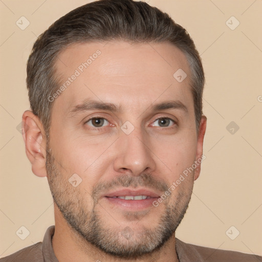 Joyful white adult male with short  brown hair and brown eyes