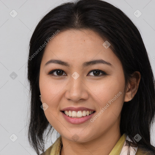 Joyful asian young-adult female with medium  brown hair and brown eyes