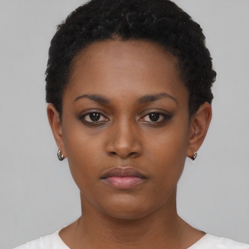 Neutral black young-adult female with short  black hair and brown eyes