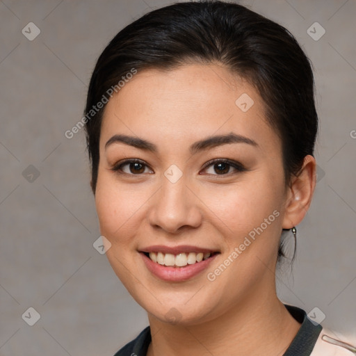 Joyful white young-adult female with medium  brown hair and brown eyes