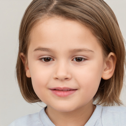 Joyful white child female with medium  brown hair and brown eyes