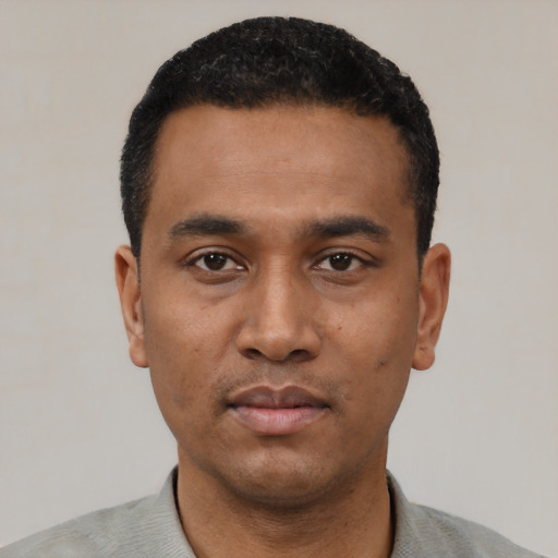 Neutral black young-adult male with short  black hair and brown eyes
