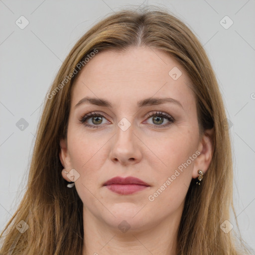 Joyful white young-adult female with long  brown hair and green eyes