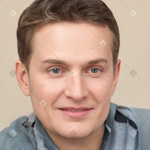 Joyful white adult male with short  brown hair and grey eyes