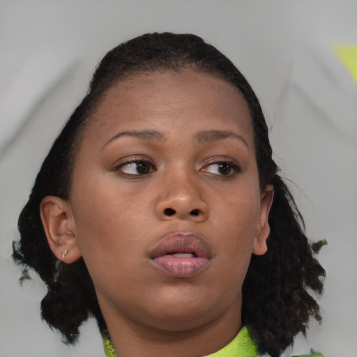 Neutral black young-adult female with medium  brown hair and brown eyes