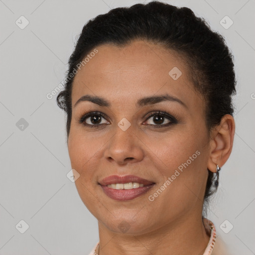 Joyful latino young-adult female with short  brown hair and brown eyes