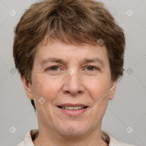 Joyful white adult male with short  brown hair and grey eyes