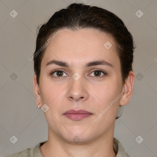 Neutral white young-adult female with short  brown hair and brown eyes