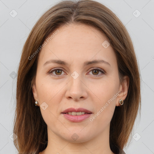 Joyful white adult female with medium  brown hair and brown eyes